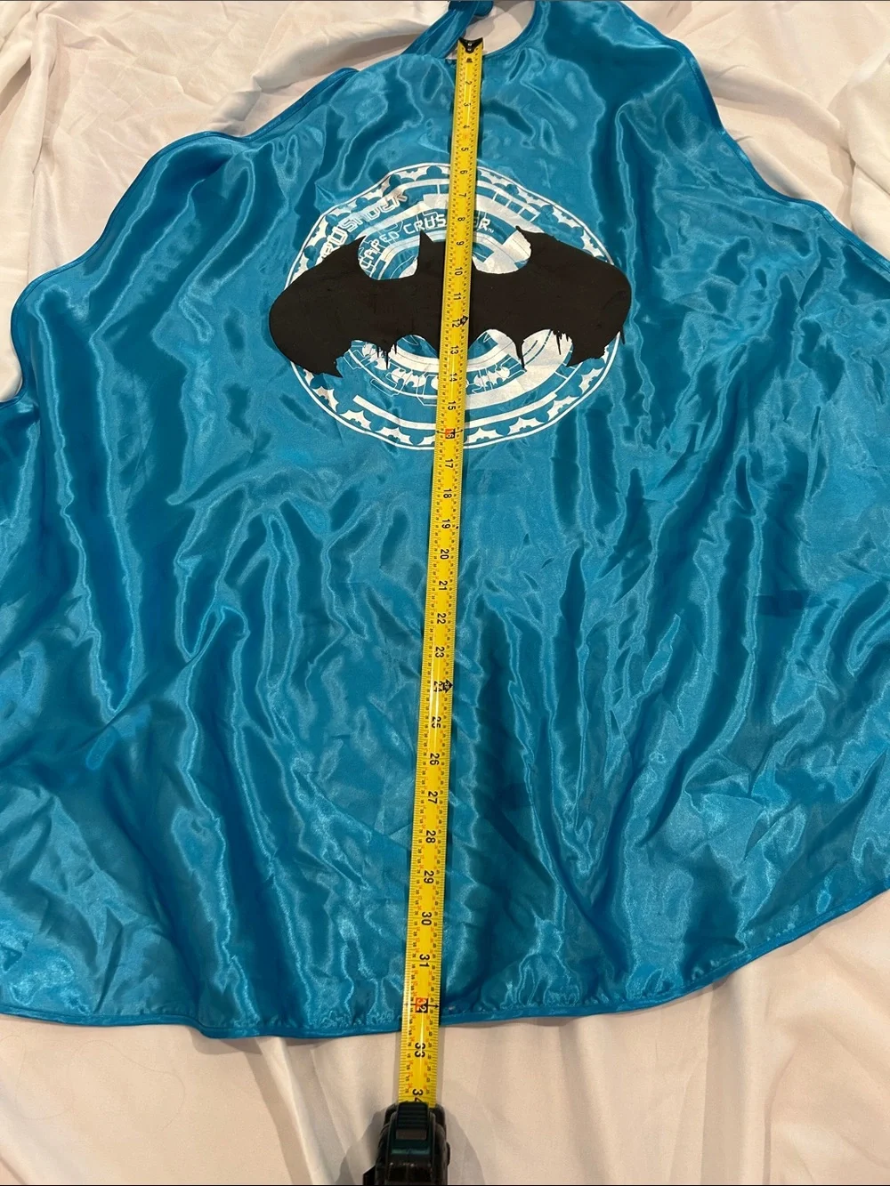 Bright blue Batman cape